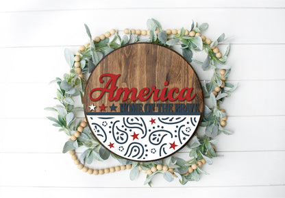 America Home of the Brave  - Round  Wood Door Sign | Hanger | ChicaTiza Paint Kit